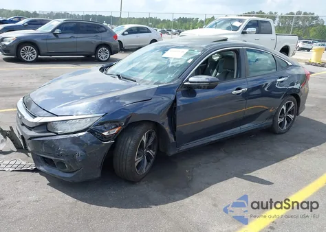 2016 Honda Civic Touring z USA, uszkodzony, nr VIN 19XFC1F92GE203907
